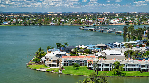 istock Modern holiday luxury accommodation with the sweeping road bridge beyond 2224039706
