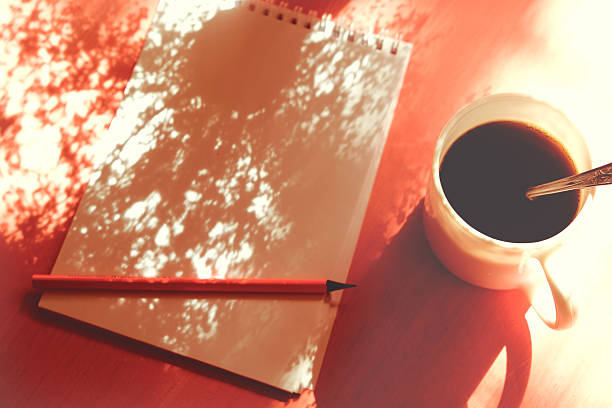 istock Cup of coffee, notepad, pencil on paper, sketchbook,  background with casting shadows . Inspiration and New story concept 2224040830