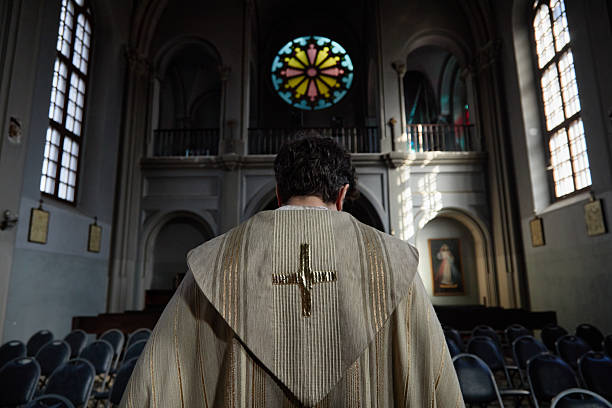 istock Man Praying Alone in Church Sanctuary during Daytime 2224042388