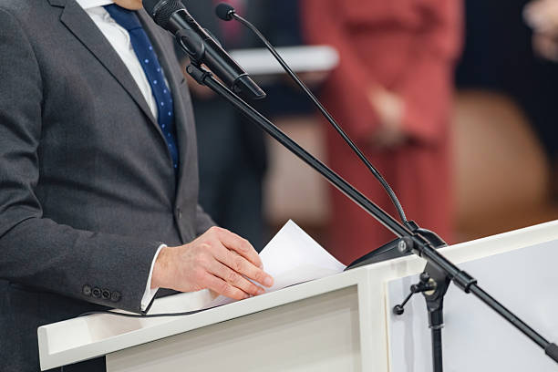 istock The speaker promotes accurate reporting and public trust through structured, engaging communication, conveying a focused message at a media press conference ensures clarity for journalists. 2224043445