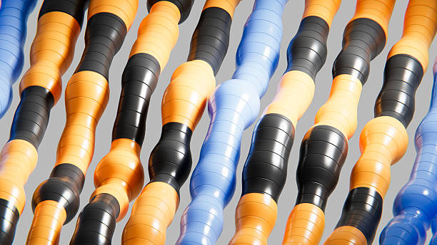 istock Orange and black inflatable tubes creating a futuristic pattern with a touch of blue 2224049886