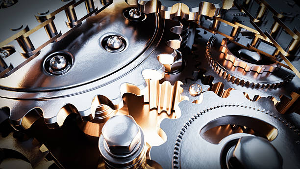 istock Metallic gears interlock and rotate, representing complex machinery, precision, and industrial processes 2224049935