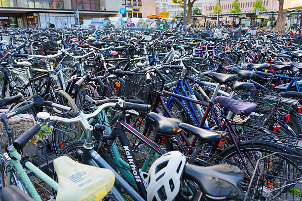 Large group of bicycles in a multi level bicycle parking rack at Zwolle train station in Holland.