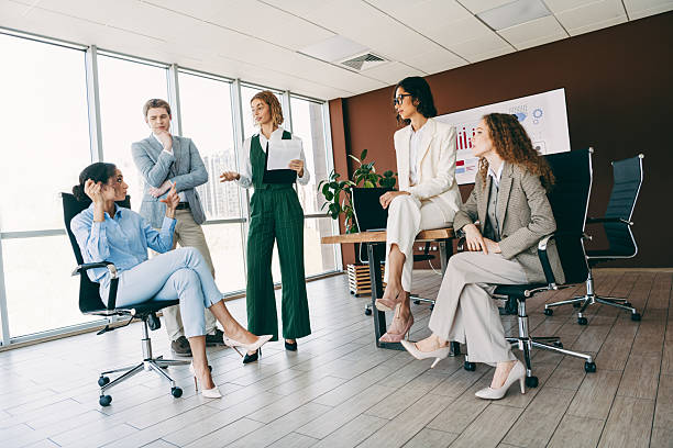 istock Professional team discussing project ideas in a modern office setting, showing teamwork and collaboration 2224053784