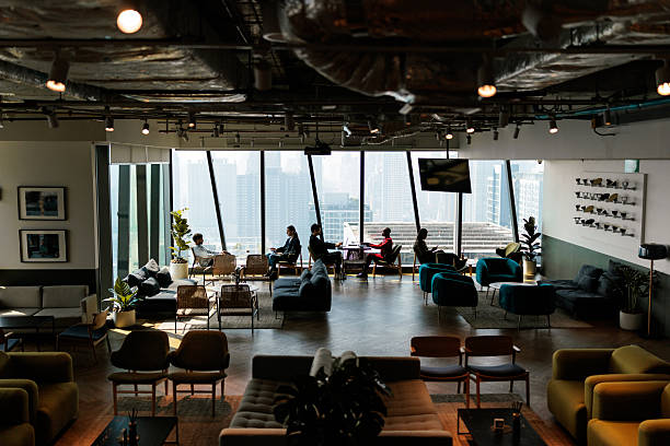 Business people at work in a busy luxury office space