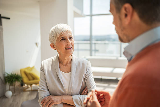 istock Professional discussion in a modern bright office setting with two colleagues 2224056638