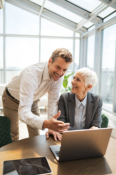 istock Professional colleagues collaborate on project in modern office with natural light 2224056665