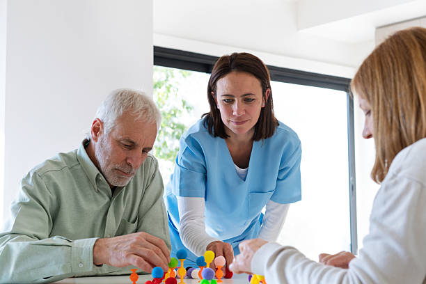 istock Senior man and woman doing motor skill activities 2224064012