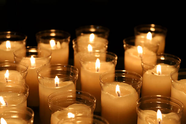 istock Group of candles in a church 2224064986