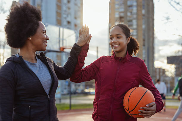 istock Active Black Family Playing Basketball Together 2224065058