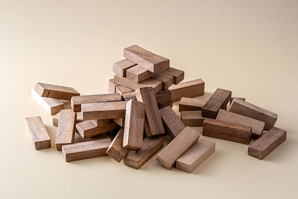 istock Wooden Blocks Stacked in a Creative Arrangement on Neutral Background 2224065831