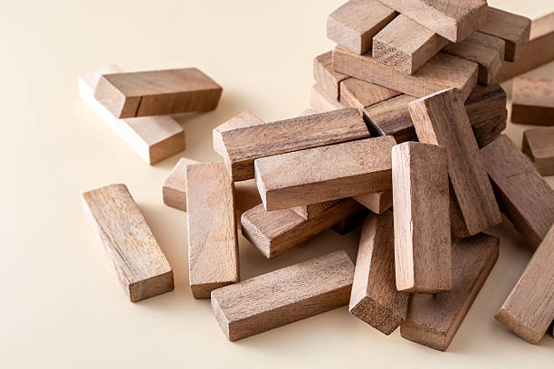 istock Wooden Blocks Stacked and Piled on a Light Background for Playtime 2224065860