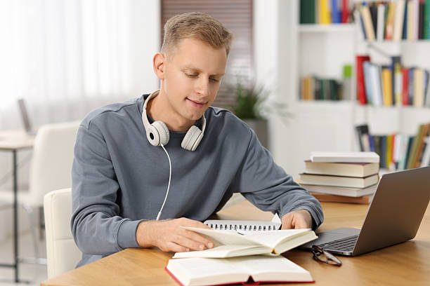 istock Student preparing for exam at table indoors 2224067364