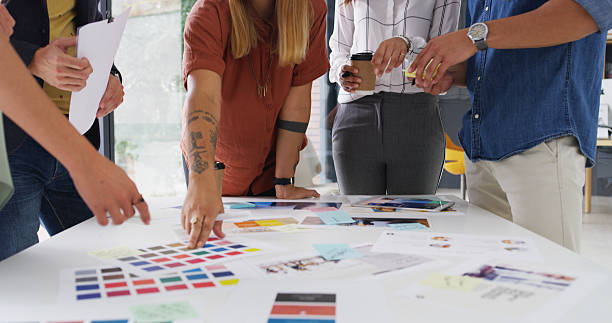 istock Color swatch, hands or people with teamwork for planning, brand choice or approval decision. Meeting, review or creative project manager with group, tablet or designers for company identity or task 2224067445