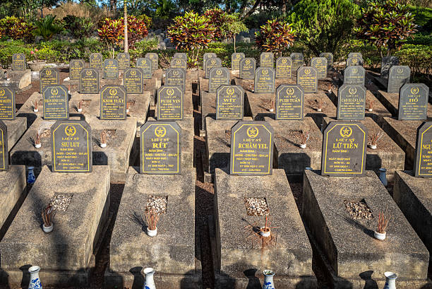 War graves in the War Martyrs Cemetery in Ia Grai, Gia Lai Province in the Central Highlands of Vietnam.\nThe graves mainly contain the remains of local ethnic minority men who dies in the Vietnam War against the US in the 1960s and early 1970s, as well as soldiers who died fighting the Khmer Rouge in Cambodia in the 1980s.\nwar cemeteries can be found all over Vietnam following various wars in the second half of the 20th century.