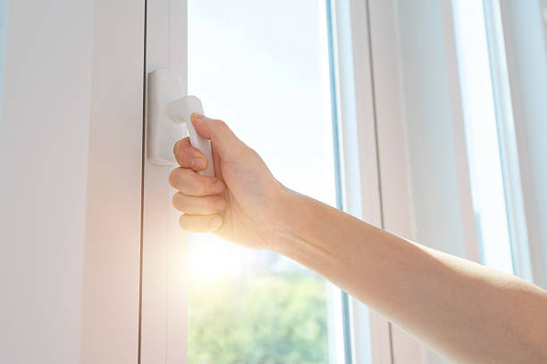 istock Woman hand holding handle and open the window 2224070086