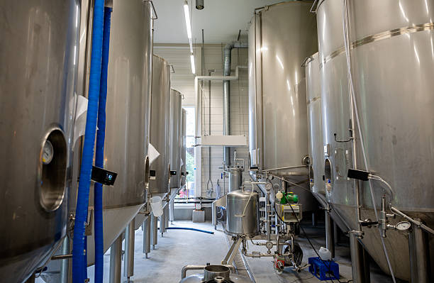 istock Stainless steel brewing tank inside modern craft brewery facility 2224070761