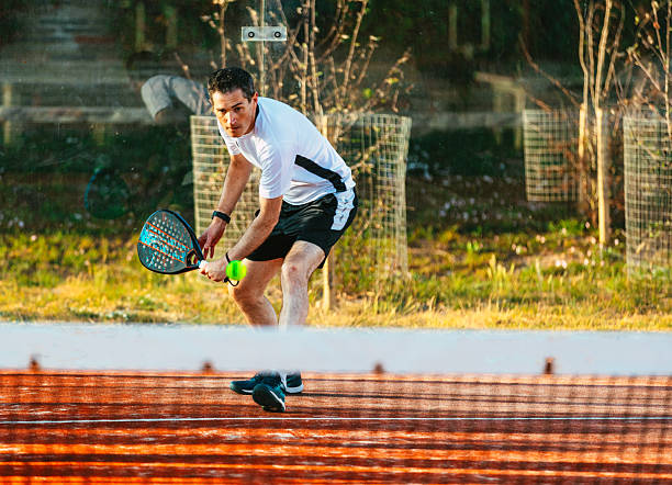 istock Mid adult man playing padel on the outdoors court 2224076607
