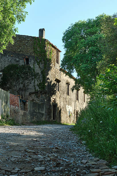 istock Rustic stone house next to a gravel path in serralada marina 2224077003
