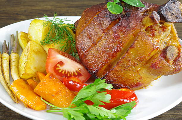 Club Beef steak with pepper sauce and Grilled vegetables on cutting board on dark wooden background. High quality photo