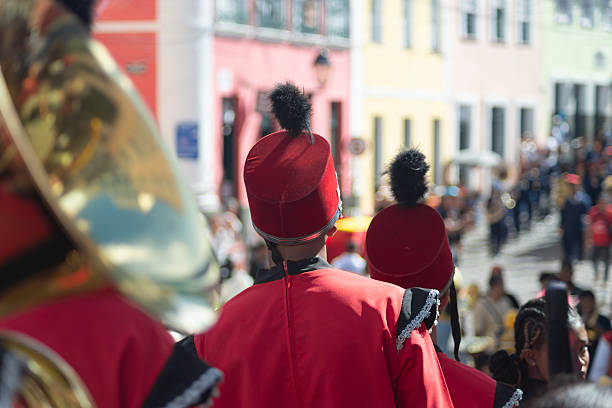 Salvador, Bahia, Brazil - July 02, 2025: Public school students are seen playing a musical instrument during a Bahia independence civic parade in Pelourinho, Salvador, Brazil.