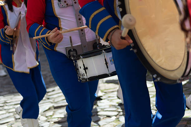 Salvador, Bahia, Brazil - July 02, 2025: Public school students are seen playing a musical instrument during a Bahia independence civic parade in Pelourinho, Salvador, Brazil.