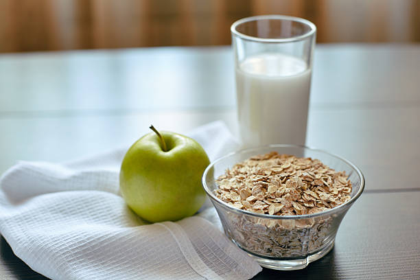 istock Oatmeal with milk, banana, apple and lemon 2224082799
