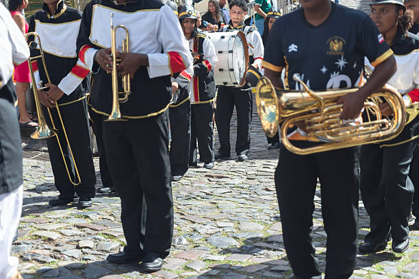 Goiânia, Goias, Brazil – September 07, 2023: Boy in uniform, accompanied by a band, in a Brazilian Independence Day parade.