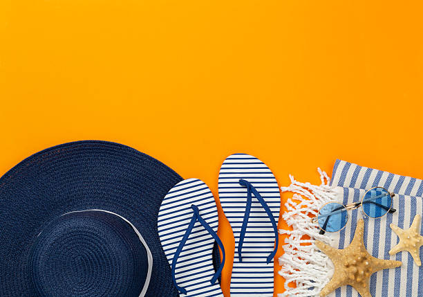 istock Blue beach accessories on color background, top view. Copy space for text 2224089542