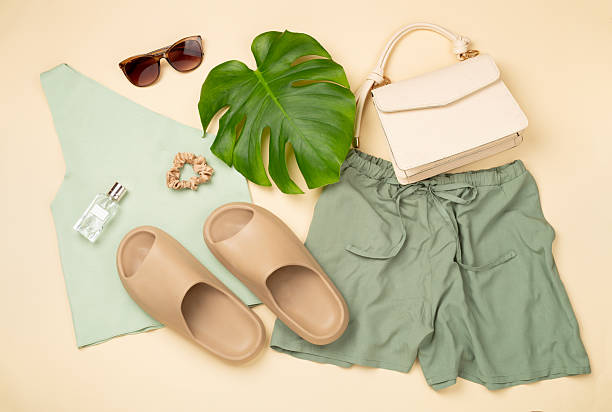 istock Flat lay with casual summer outfit on color background, top view 2224089543