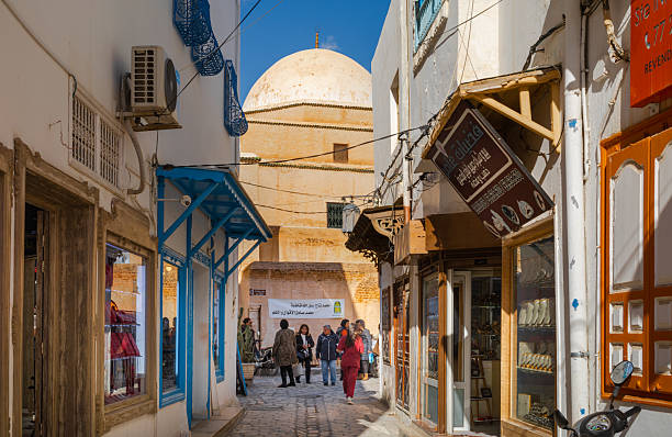 Tunis,Tunisia - September 14th, 2012 : People walking around the streets of Medina, famous marketplace in Tunis, Tunisia.
