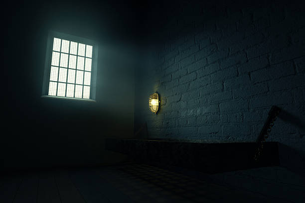 istock 3d rendering of grunge prison cell with bed and cell lighting 2224092218