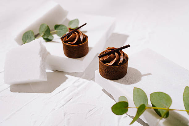 istock Delicious chocolate mousse cups decorated with chocolate sticks 2224092756