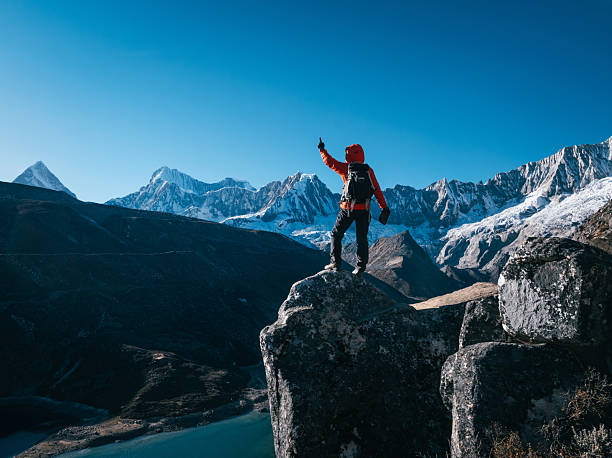 istock Backpacking hikers hiking on high altitude mountain top 2224092802