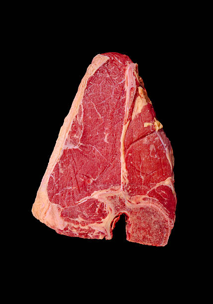 istock High-quality raw meat cut on a black background showcasing marbling 2224093323