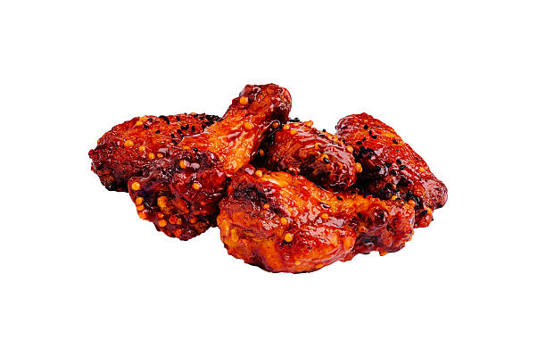 istock Delicious spicy chicken wings served on a white background 2224095031