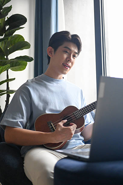 istock Homegrown Talent: Ukulele Tunes in the Living 2224098198