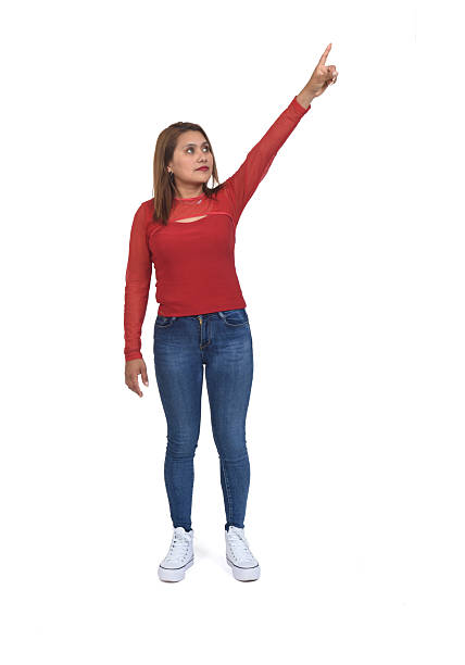 istock woman pointing on white background 2224101739