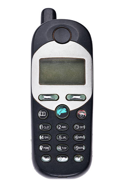 Classic mobile phone from the early 2000s with simple design isolated on white background.