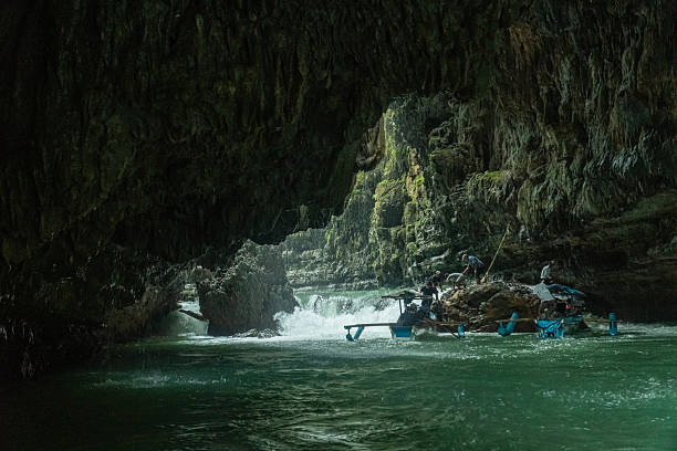 istock Wide shot of a river cave and cliffs in Green Canyon, Pangandaran, West Java, Indonesia. One of the most famous tourist attractions in West Java. 2224105987