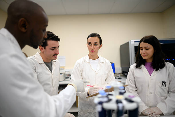 istock Team of scientists collaborating in a modern laboratory environment 2224106604