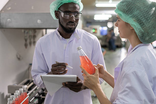 istock quality inspector food or beverages technician inspection about quality control food or beverages before send product to the customer. Production leader recheck ingredient and productivity. 2224108984
