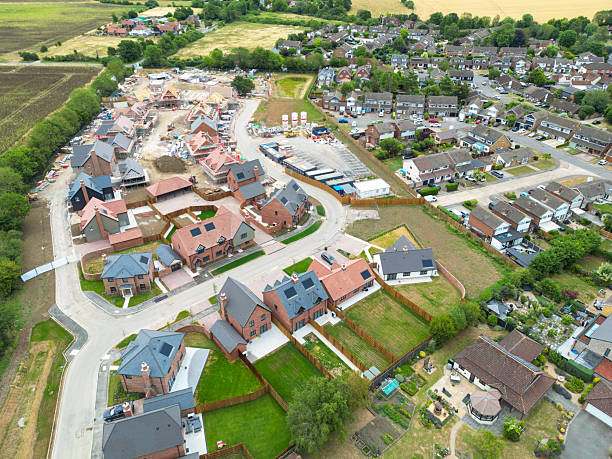 istock Aerial view of a newly completed British housing development showing both expensive, detached homes and more affordable semi detached houses in rural Essex. 2224109197