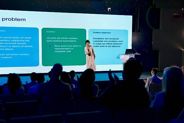 istock Confident Woman Presenting About Technology Innovations at a Professional Conference 2224110642