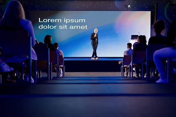 istock Man Presenting a Professional Keynote Speech at a Business Technology Conference 2224110744