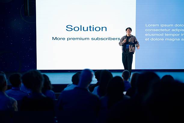 istock Professional Speaker Presenting Ideas to an Audience at a Technology Conference 2224110770