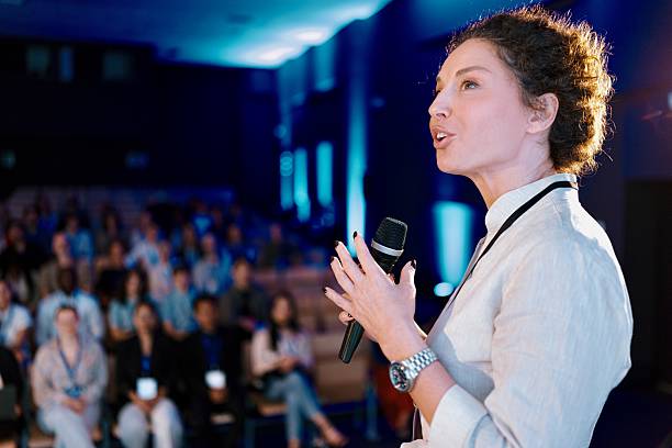 istock Confident Speaker Presenting on Women in Technology at a Modern Conference Event 2224110822