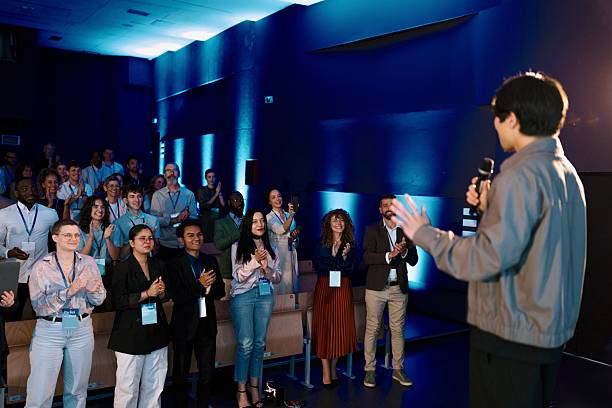istock Audience Applauding Guest Speaker at Business Conference 2224110885