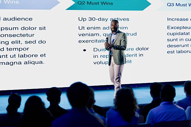 istock Professional Speaker Presenting at Tech Conference in a Modern Venue 2224111014