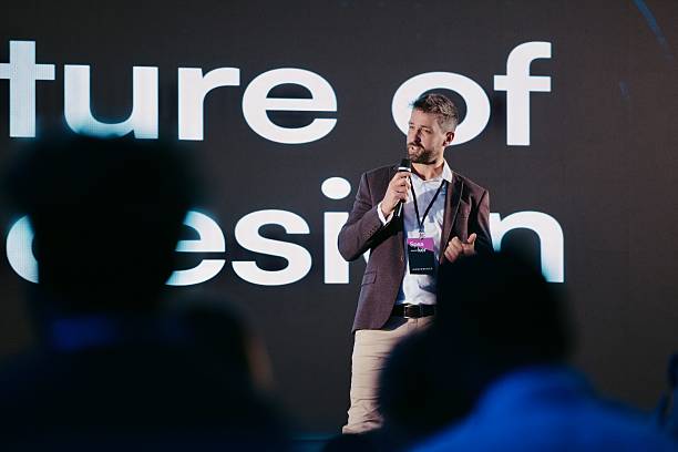 istock Confident Presenter Speaking at a Technology Conference About Innovative Design Concepts 2224111066